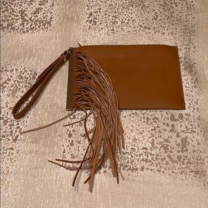 Wristlet with fringe and gold accents